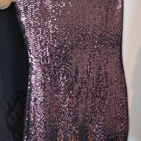 A sparkling mini dress. Open back. - Picture 2 of 4
